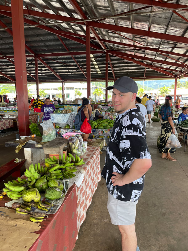 UA research assistant Grant Pethel checking out the market, Apia, Samoa.