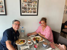 PicturDr. Bernadette Samau & I meeting for breakfast back in March when we first starting brainstorming our collaboration.e